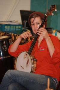 Anna plucking her banjo