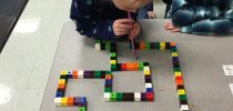 Kindergarteners in Mrs. Pace’s class create wind-powered mazes for STEM week.