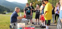 Jon Serenius often takes his class outside to conduct science experiments. Students created a filter using sand, rocks, leaves, and grass to demonstrate how water is filtered by nature.